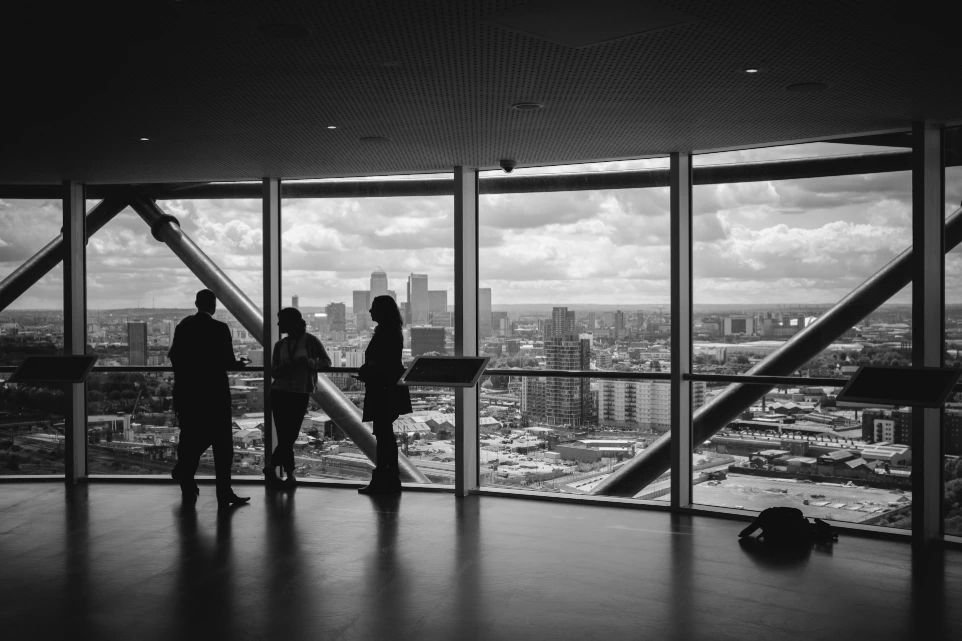 people standing inside city building